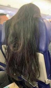 Hair Over Airplane Seat