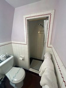 A photo of the bathroom and shower inside the tee pee
