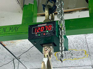 Scale shows the ball weighs 12,070 pounds